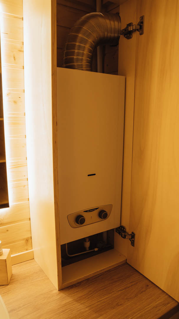 Fully Off Grid Tiny House with Wood Stove and Clean Water Tank
